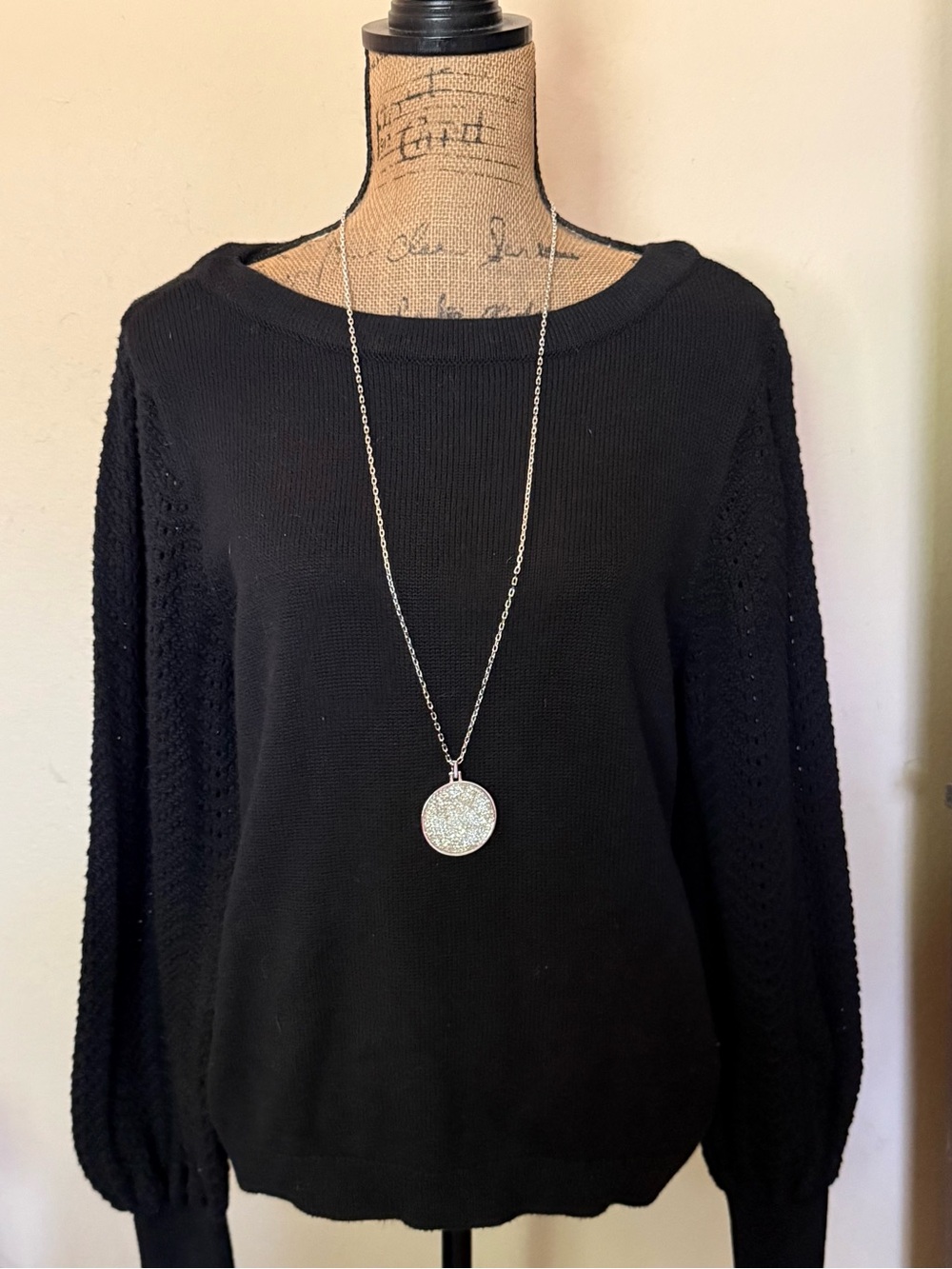 Classic black sweater with sleeve design-new without tag (necklace not included)